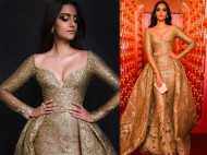 We can't stop crushing over Sonam Kapoor's gold red carpet look!