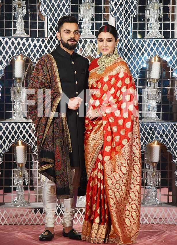 First pictures: Anushka Sharma and Virat Kohli look regal at their ...