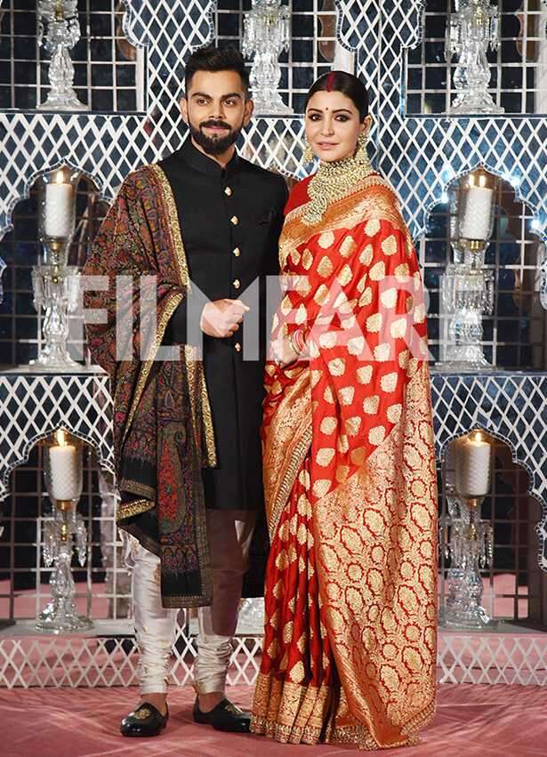 First pictures: Anushka Sharma and Virat Kohli look regal at their ...