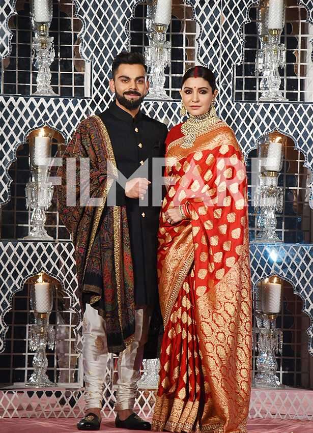 First pictures: Anushka Sharma and Virat Kohli look regal at their ...