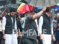 Amitabh Bachchan and Abhishek Bachchan arrive for Shashi Kapoor's funeral