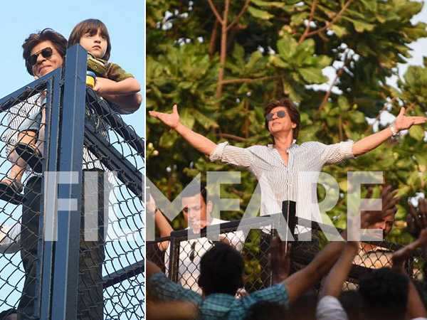 Pictures Shah Rukh Khan And Son Abram Wave Out And Greet Fans At 