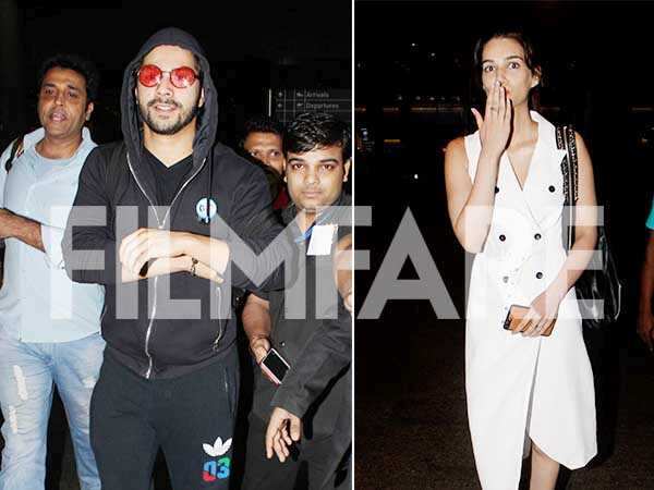 In Pictures: Varun Dhawan returns from Budapest while Kriti Sanon ...