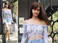 Disha Patani looks attractive as she steps out sporting a buttoned-up denim skirt
