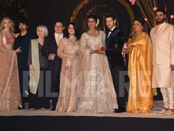 See Priyanka Chopra and Nick Jonas' High-Fashion Family Wedding Photo