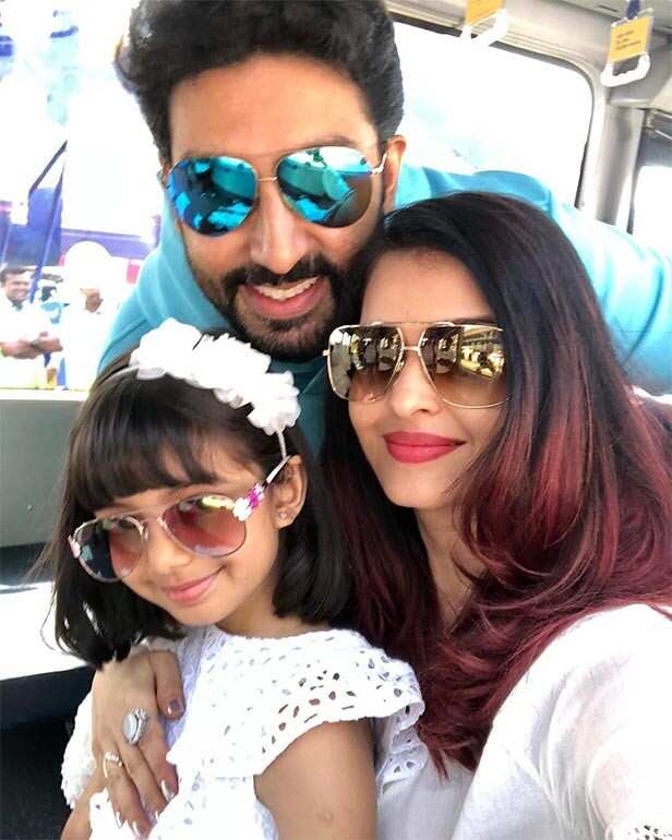 Aishwarya Rai and Abhishek Bachchan soak up the sun in NYC with fans. See  pic