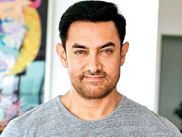 Aamir gets a haircut  Rediffcom