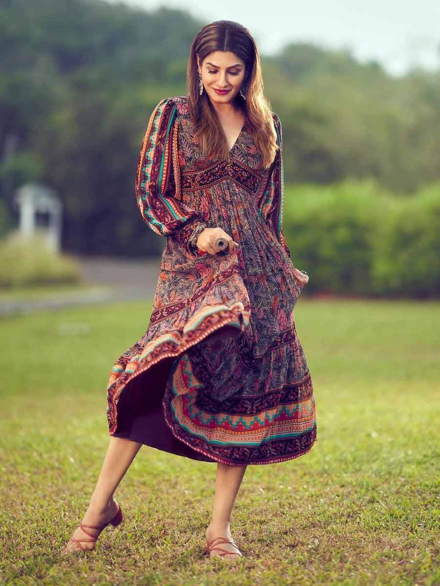 Raveena Tandon picture in grass.