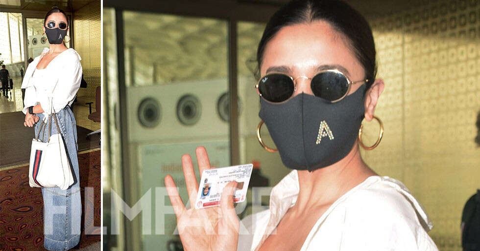 Alia Bhatt sports the classic denim and white combo at the Mumbai airport