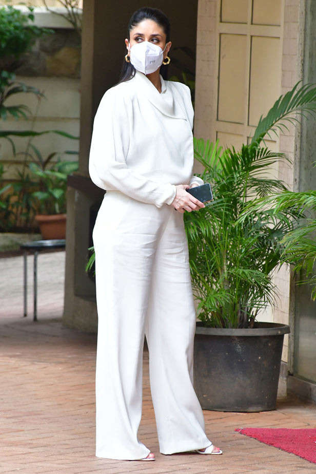 Janhvi Kapoor Keeps It Classy In White Shirt & Black Flared Trousers