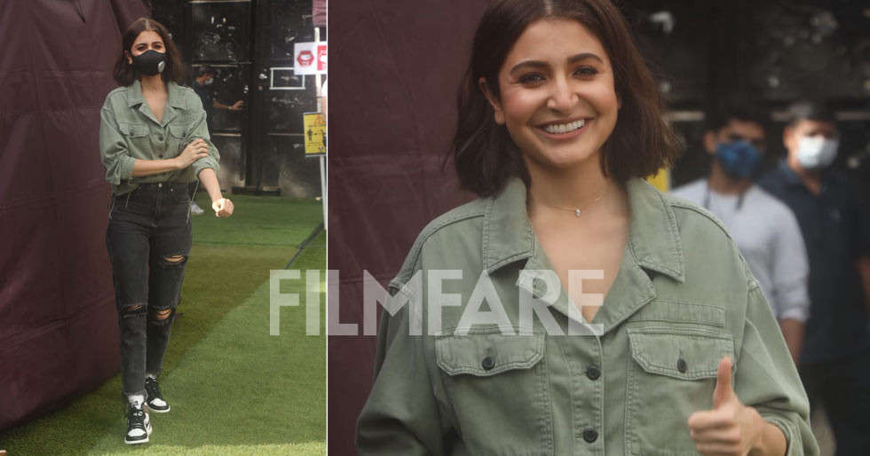 Pictures: Anushka Sharma smiles and poses for the paps