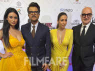 Malaika Arora, Anil Kapoor and Anupam Kher pose for pictures on the red carpet