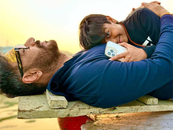 Ajay Devgn shares a picture with son Yug as they find their 'small moment of peace.'