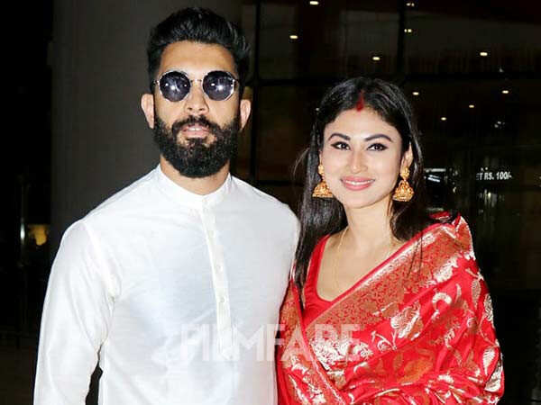 Photos: Newlyweds Mouni Roy, Suraj Nambiar return to Mumbai | Filmfare.com