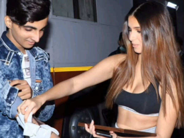 A fan tattooes Tara Sutaria's face on his arm after getting Kartik Aaryan tattooed on his chest