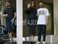 Sonam Kapoor Ahuja picks a black outfit, gets papped with Anand Ahuja and Karan Boolani