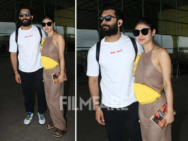 Mouni Roy and husband Suraj Nambiar snapped holding hands at the airport