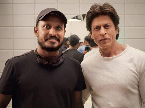 Shah Rukh Khan is all smiles as he obliges fan with a pic