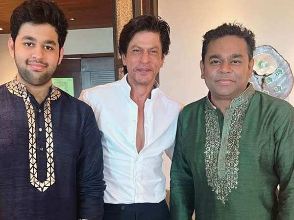 Shah Rukh Khan poses with A.R. Rahman and his son A.R.Ameen