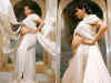 Sonam Kapoor is a goddess as she flaunts her baby bump in an ivory satin ensemble