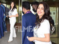 Janhvi Kapoor is all smiles as she gets snapped in an all-white attire at the airport