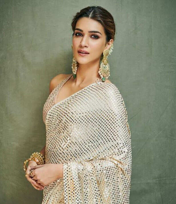 Kriti Sanon Shimmery Off white gold saree.