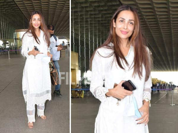 Malaika Arora clicked in white ethnic suit at the airport