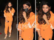 Rashmika Mandanna clicked dressed in a tangy orange tracksuit at the airport