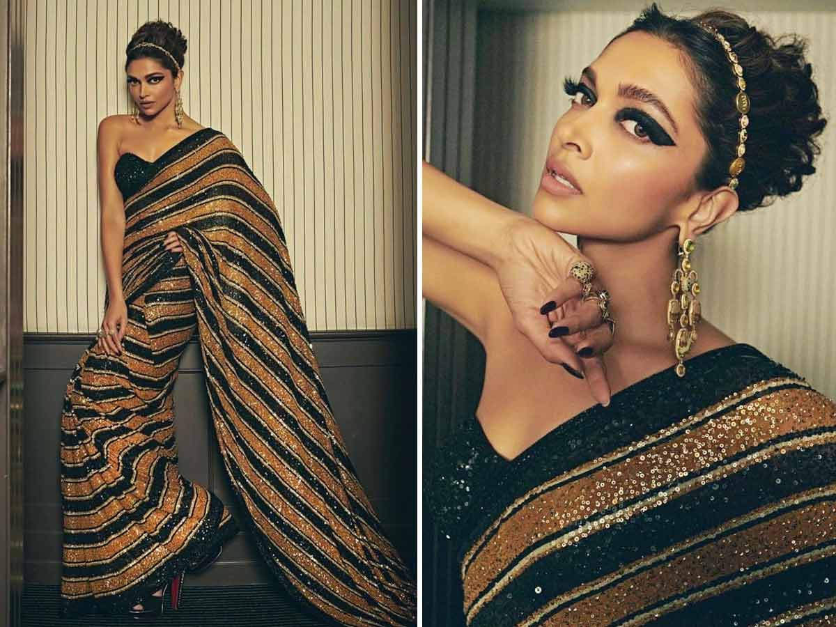 Best Looks From Cannes 2022 : Deepika Padukone In a Black and Gold Sequin Saree.