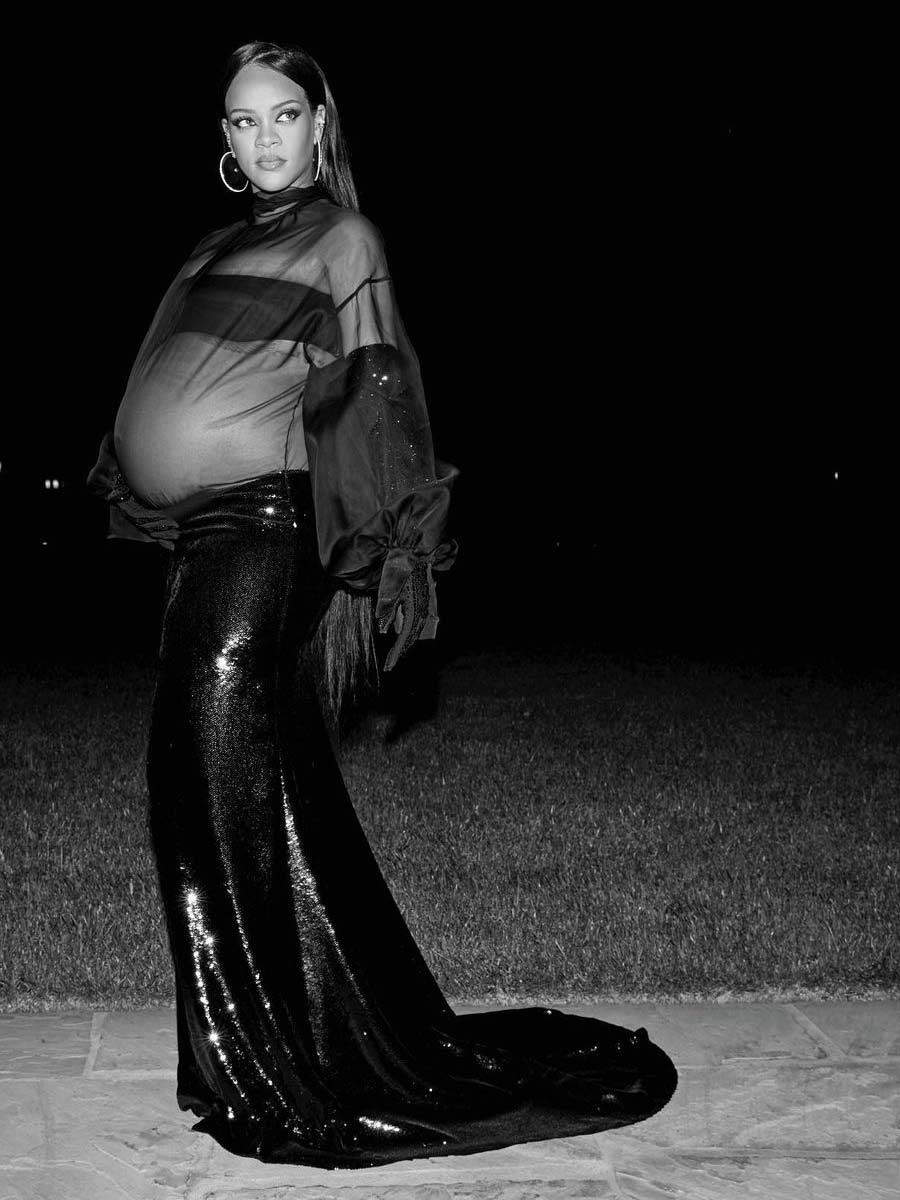 Rihanna black and white picture showcasing her baby bump.