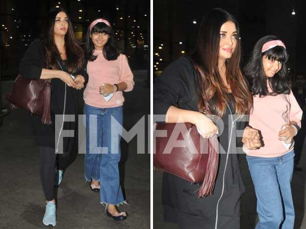Aishwarya Rai Bachchan holds Aaradhya close as the mother-daughter duo gets clicked at the airport
