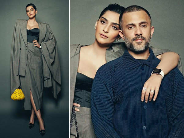 Sonam Kapoor poses with her ‘handsome date’ Anand Ahuja as they attend the Apple store launch