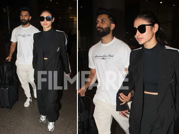 Mouni Roy and Suraj Nambiar clicked arriving at the airport today ...