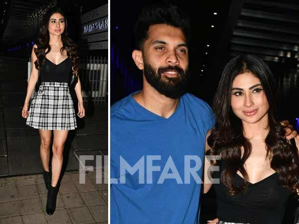 Mouni Roy rocks a gingham print skirt as she gets clicked with Suraj Nambiar in Mumbai