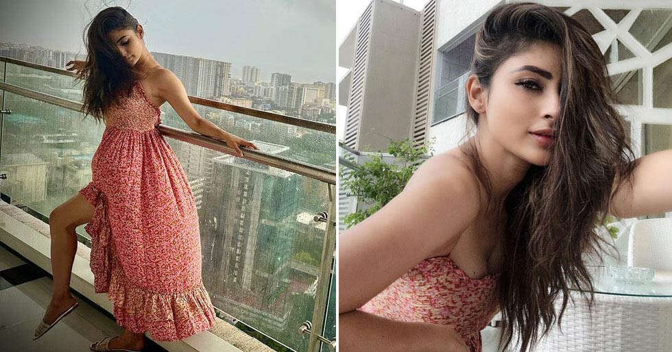 Mouni Roy enjoys rain from her balcony in a hot pink dress