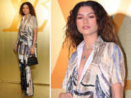 Zendaya aces a shimmering prints pantsuit as she attends a fashion show in Paris