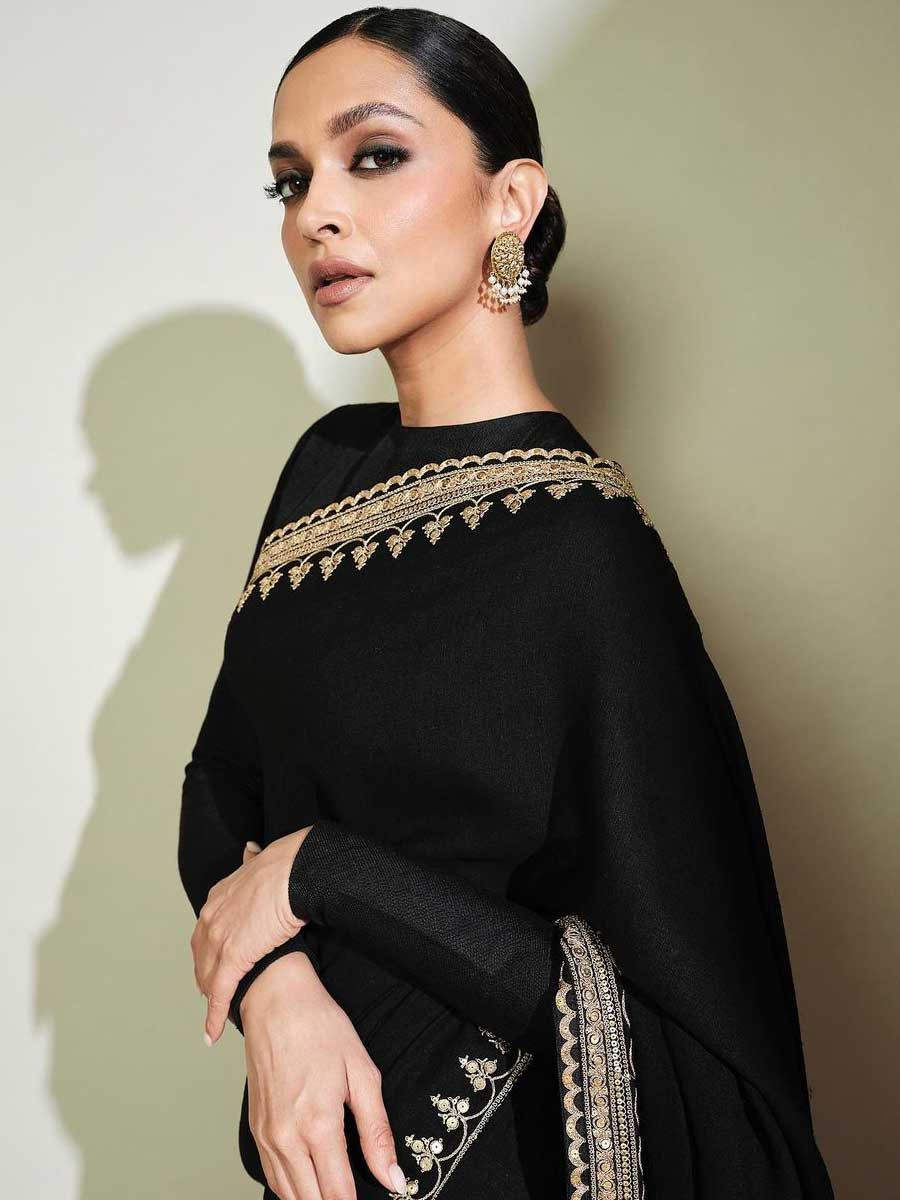 Sabyasachi - Romantic power dressing in a jet black saree. The lavish blouse  is hand-embroidered on black tulle with vintage threadwork and appliqué,  mimicking an eighteenth century Parisian tapestry featuring European flora