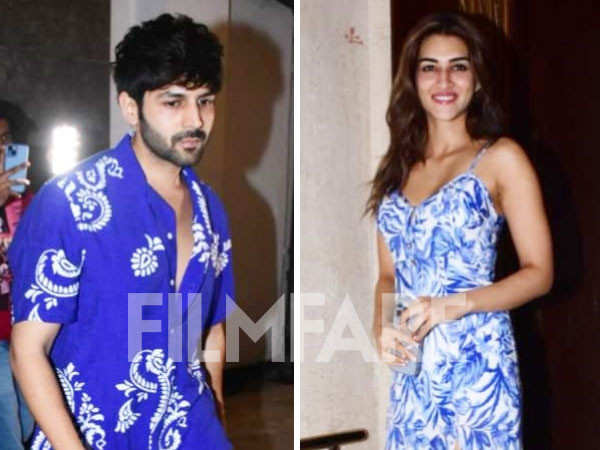 Kriti Sanon and Kartik Aaryan twin in blue as they get clicked at Manish Malhotra's home. Pics: