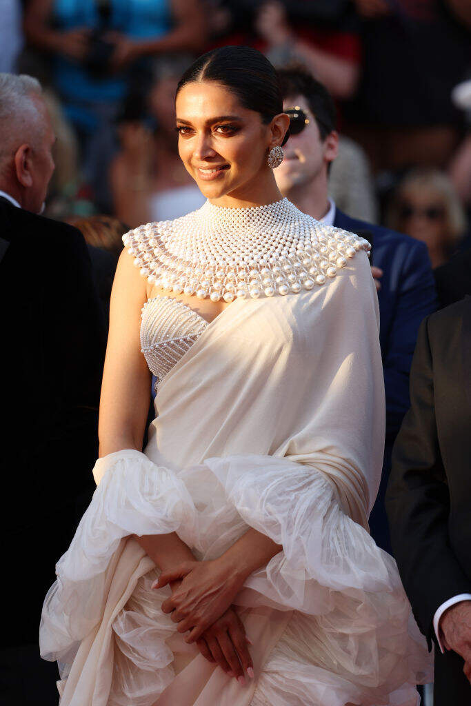 Deepika Padukone at Cannes: Actor impresses in pearls bustier and collar  with ruffled off-white sari | Fashion News - The Indian Express