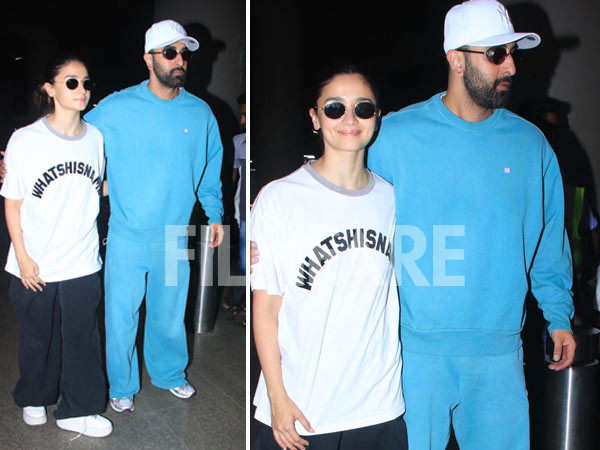 Ranbir Kapoor keeps Alia Bhatt close as they get clicked at the airport. See pics: