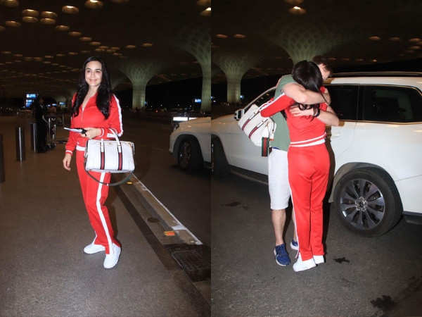 Preity Zinta hugs it out with her husband Gene Goodenough at the airport