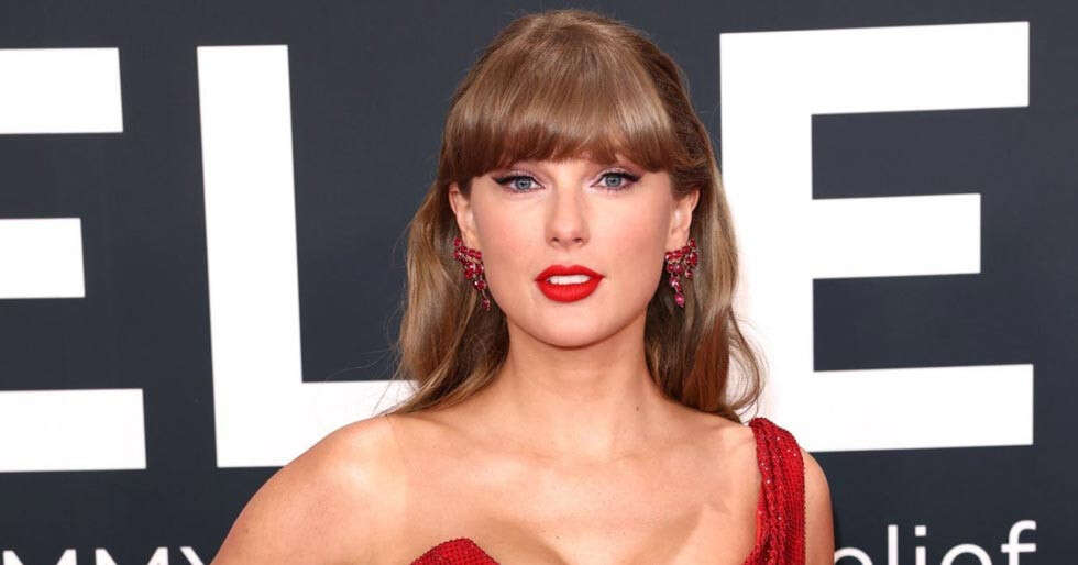 Taylor Swift stuns in bold red dress at the Grammy Awards