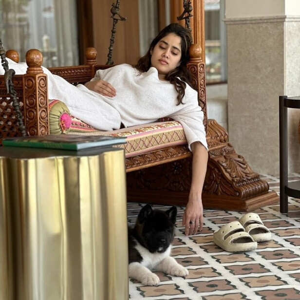 Proof That Janhvi Kapoor Was An Integral Part of Shikhar Pahariya's 2024 2 Photo: Janhvi lying on a swing in her casual outfit