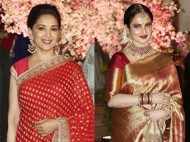 Madhuri Dixit and Rekha rock traditional wear at a wedding reception
