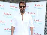 Ajay Devgn spotted at the launch of a new lounge in the city