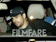 Sidharth Malhotra watches a movie with his family