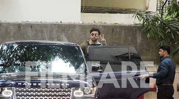 Ranbir Kapoor looks attractive in a grey and mocha colored hoodie