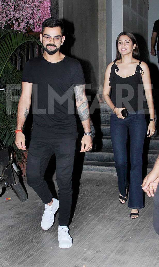 Anushka Sharma and Virat Kohli twin in black and white outfits