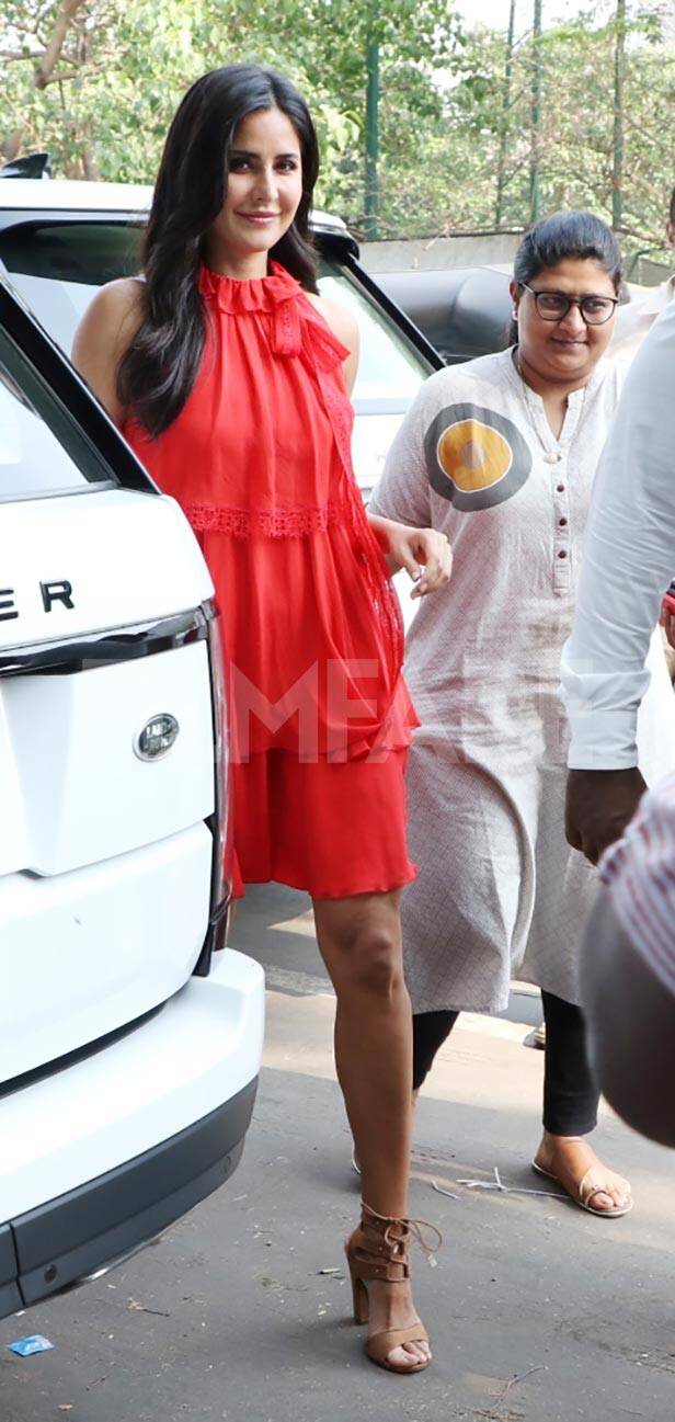 Katrina Kaif looks like a bomb in red as she hangs out with Arbaaz Khan |  Filmfare.com