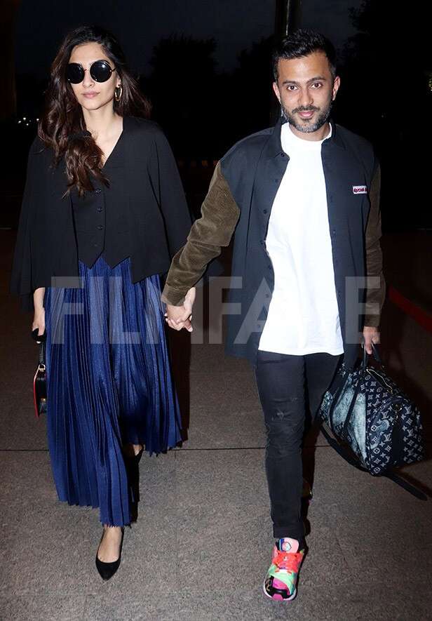 Sonam Kapoor and Anand Ahuja spotted at the Mumbai airport | Filmfare.com